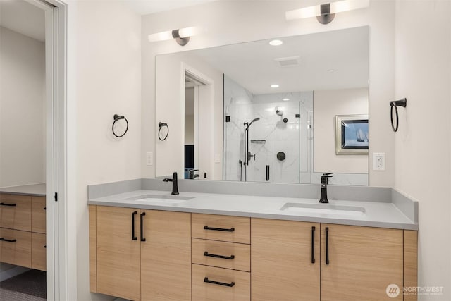 330 3rd Ave S Unit C, Kirkland, WA 98033 - bathroom featuring a shower stall, double vanity, and recessed lighting