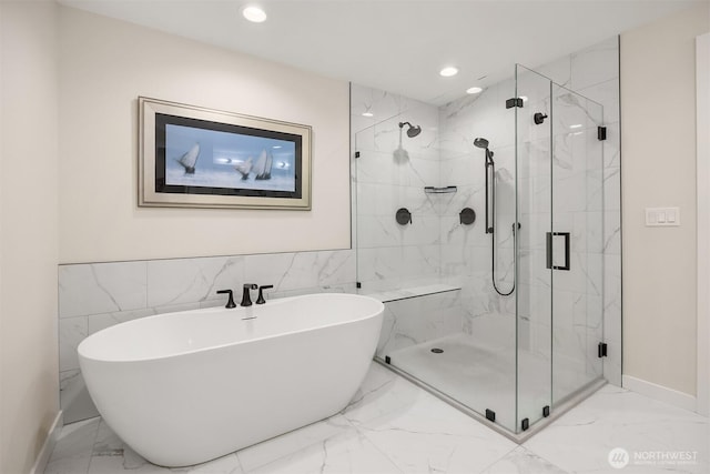 330 3rd Ave S Unit C, Kirkland, WA 98033 - bathroom with marble finish floors, a soaking tub, a marble finish shower, and recessed lighting