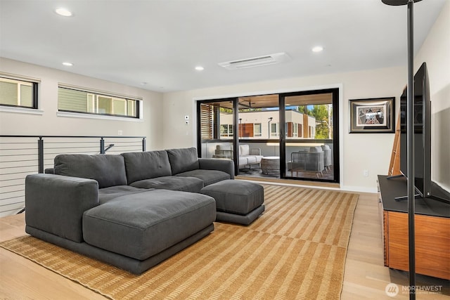 330 3rd Ave S Unit C, Kirkland, WA 98033 - living room featuring light wood-style flooring and recessed lighting