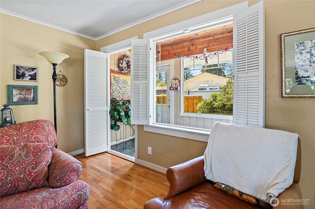 541 75th Way NE, Olympia, WA 98506 - living area featuring wood finished floors and crown molding