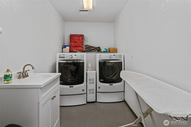 541 75th Way NE, Olympia, WA 98506 - laundry area with washing machine and clothes dryer and cabinet space