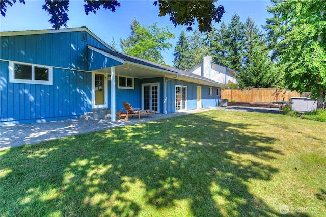 541 75th Way NE, Olympia, WA 98506 - rear view of property with a chimney and a patio