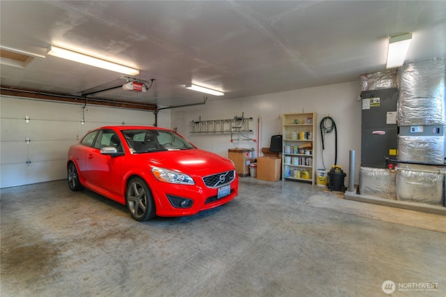 541 75th Way NE, Olympia, WA 98506 - garage featuring a garage door opener