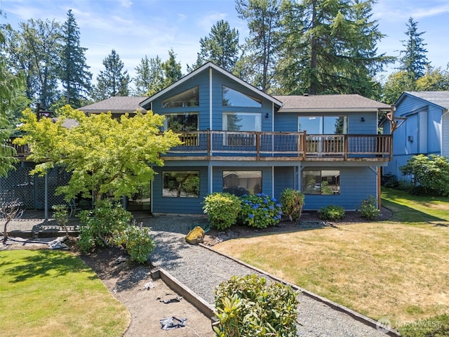 21410 SE 265th Pl, Maple Valley, WA 98038 - view of front facade with a front lawn, a wooden deck, and roof with shingles
