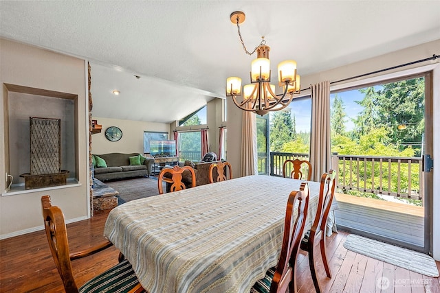 21410 SE 265th Pl, Maple Valley, WA 98038 - dining room featuring a chandelier, hardwood / wood-style flooring, healthy amount of natural light, and lofted ceiling