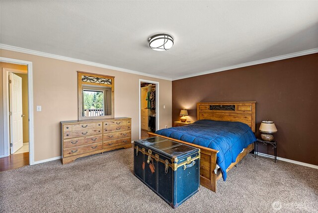 21410 SE 265th Pl, Maple Valley, WA 98038 - bedroom with ornamental molding, carpet, and a walk in closet