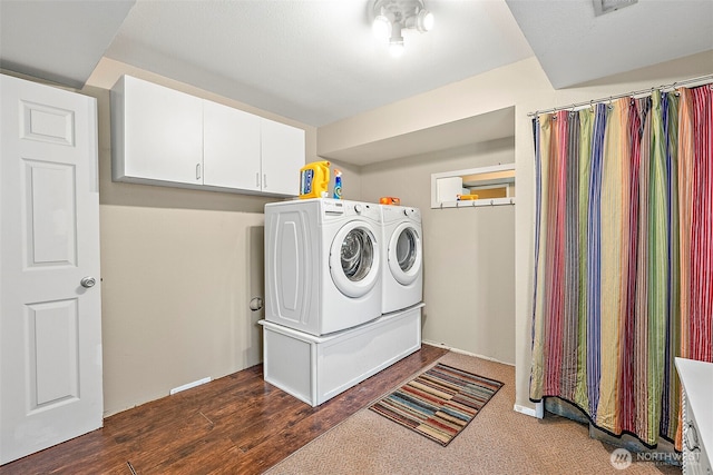 21410 SE 265th Pl, Maple Valley, WA 98038 - washroom featuring independent washer and dryer, dark wood-style flooring, and cabinet space