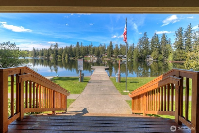 21410 SE 265th Pl, Maple Valley, WA 98038 - wooden deck featuring a water view, a yard, and a wooded view