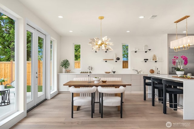 3968 162nd Pl SE, Bellevue, WA 98006 - dining space with light wood-style floors, a chandelier, and recessed lighting