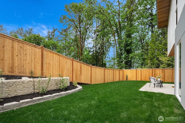 3968 162nd Pl SE, Bellevue, WA 98006 - fenced backyard with a patio area