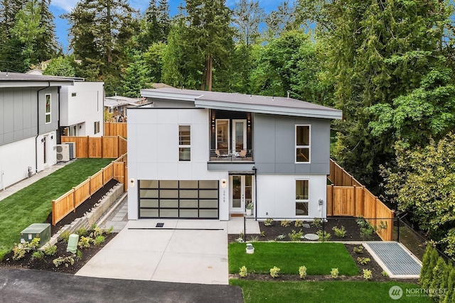3968 162nd Pl SE, Bellevue, WA 98006 - contemporary house with a balcony, driveway, and an attached garage