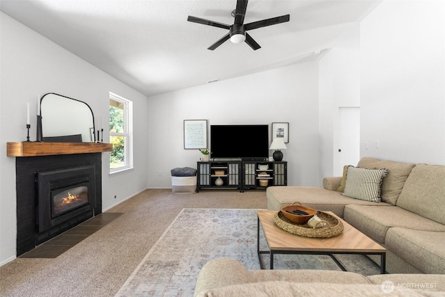 5414 70th Ave NE, Olympia, WA 98516 - carpeted living area featuring lofted ceiling, ceiling fan, and a fireplace with flush hearth