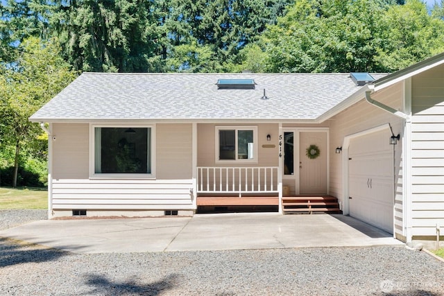 5414 70th Ave NE, Olympia, WA 98516 - ranch-style house with a porch, concrete driveway, crawl space, and an attached garage