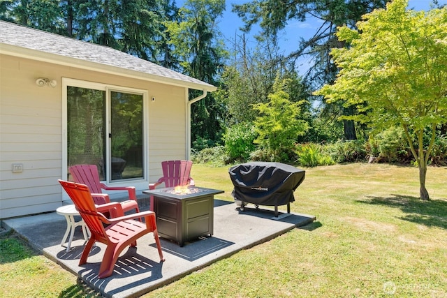 5414 70th Ave NE, Olympia, WA 98516 - view of green lawn featuring a fire pit and a patio