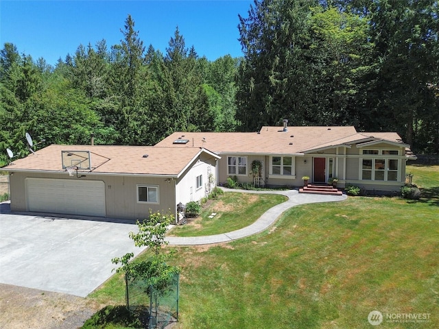 77 A Rd, Less Traveled, Sequim, WA 98382 - single story home with a garage, concrete driveway, and a front yard