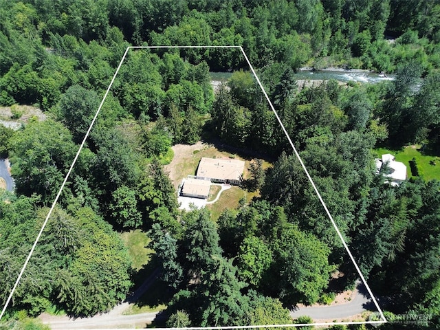 77 A Rd, Less Traveled, Sequim, WA 98382 - aerial view of property and surrounding area featuring property boundaries highlighted and a heavily wooded area