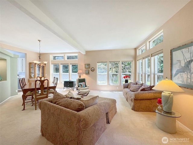77 A Rd, Less Traveled, Sequim, WA 98382 - living area featuring light carpet, a chandelier, and beam ceiling
