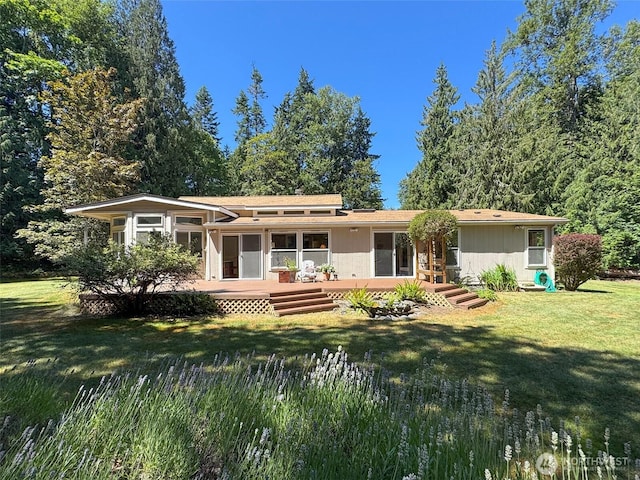 77 A Rd, Less Traveled, Sequim, WA 98382 - view of front facade with a front lawn and a deck