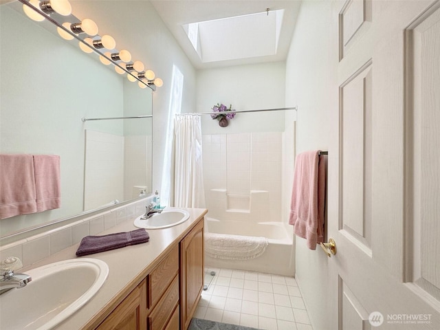 77 A Rd, Less Traveled, Sequim, WA 98382 - bathroom with a skylight, shower / bathtub combination with curtain, double vanity, and tile patterned floors