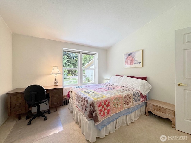 77 A Rd, Less Traveled, Sequim, WA 98382 - bedroom with light carpet, vaulted ceiling, and a desk