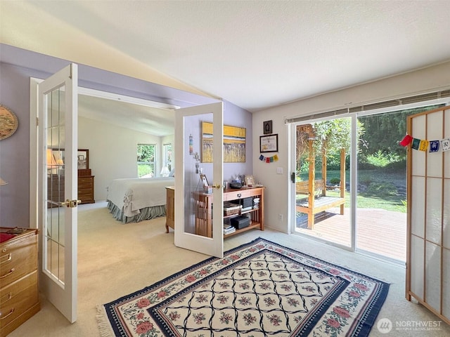 77 A Rd, Less Traveled, Sequim, WA 98382 - bedroom with carpet, access to outside, lofted ceiling, and french doors