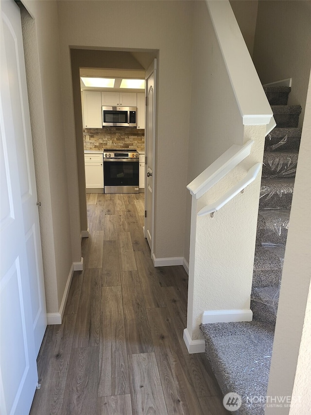 118 17th Ave SE, Olympia, WA 98501 - hallway with dark wood finished floors and stairs