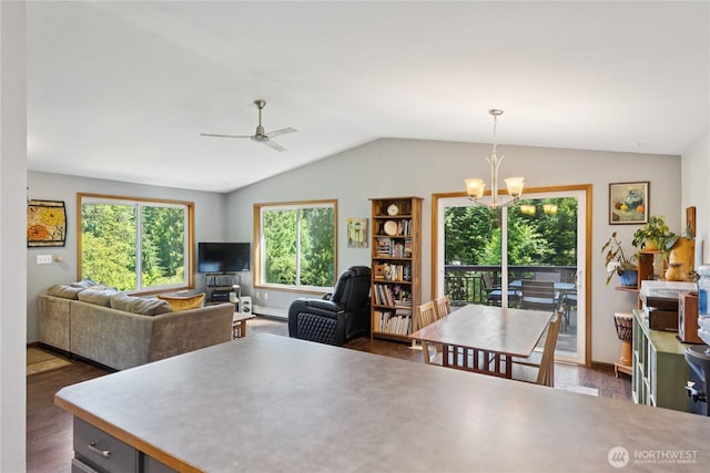 14068 Crater Lake Rd, Anacortes, WA 98221 - dining room with wood finished floors, lofted ceiling, a chandelier, and a ceiling fan