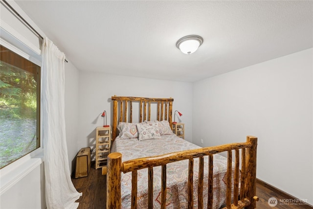 14068 Crater Lake Rd, Anacortes, WA 98221 - bedroom with dark wood finished floors