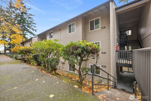 303 Kenyon St NW Unit 2D, Olympia, WA 98502 - view of side of home featuring stairs