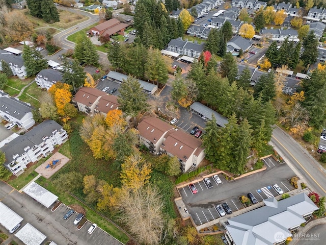 303 Kenyon St NW Unit 2D, Olympia, WA 98502 - aerial view of property and surrounding area featuring nearby suburban area
