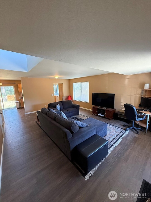 6404 220th Street Ct E, Spanaway, WA 98387 - living room featuring wood finished floors and plenty of natural light