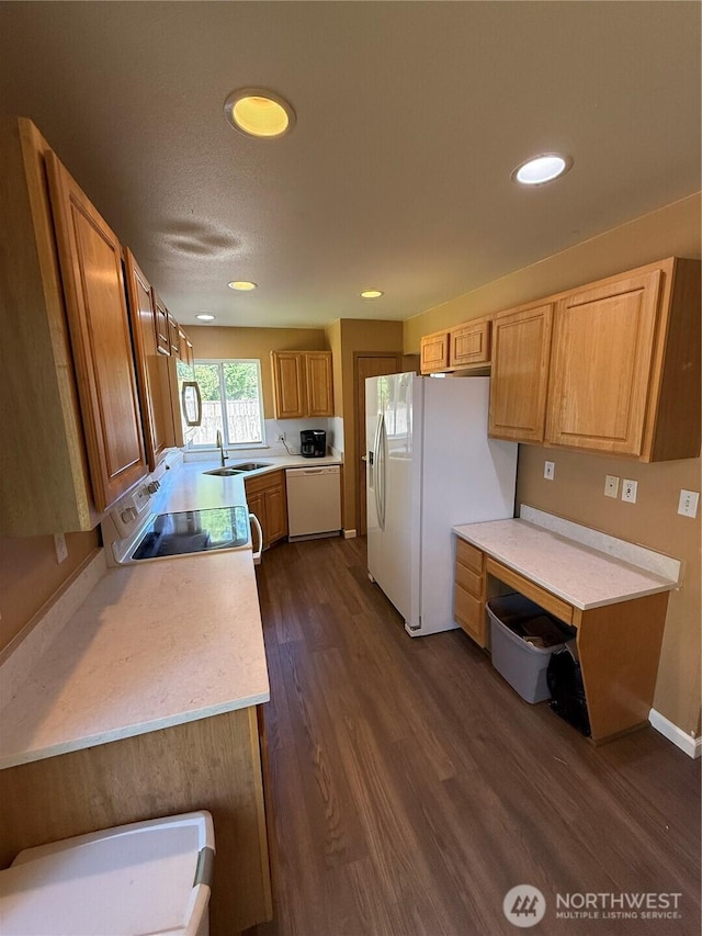 6404 220th Street Ct E, Spanaway, WA 98387 - kitchen with white appliances, light countertops, dark wood-style floors, and recessed lighting