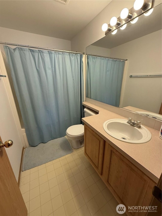 6404 220th Street Ct E, Spanaway, WA 98387 - full bath with vanity, tile patterned floors, and curtained shower