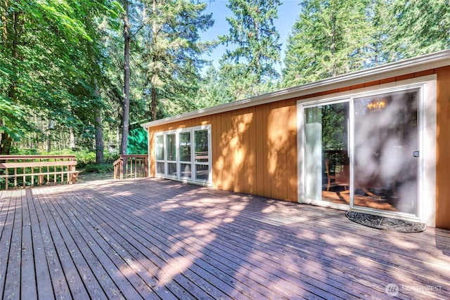 8310 207th St E, Spanaway, WA 98387 - wooden terrace with view of wooded area