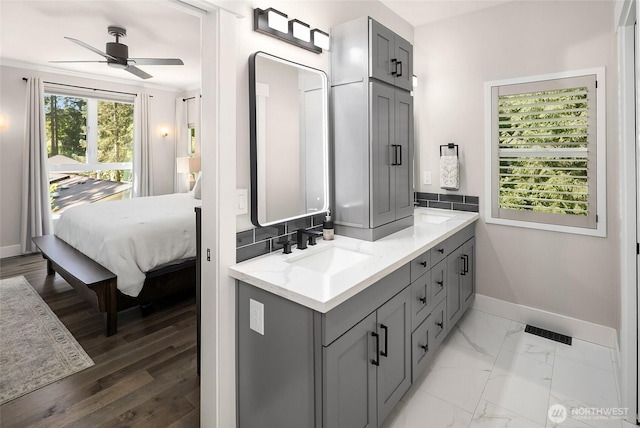 16671 SE 17th Pl, Bellevue, WA 98008 - ensuite bathroom featuring double vanity and ceiling fan