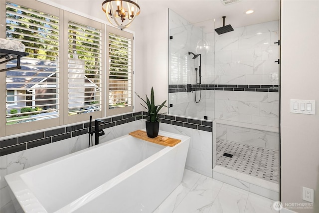 16671 SE 17th Pl, Bellevue, WA 98008 - full bathroom with a freestanding tub, a marble finish shower, marble finish floors, a chandelier, and recessed lighting