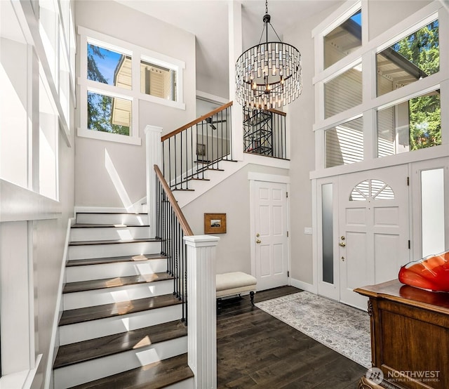 16671 SE 17th Pl, Bellevue, WA 98008 - entrance foyer featuring a towering ceiling, dark wood finished floors, a chandelier, and stairway