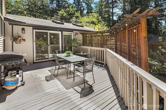 16671 SE 17th Pl, Bellevue, WA 98008 - wooden terrace with outdoor dining space and a grill
