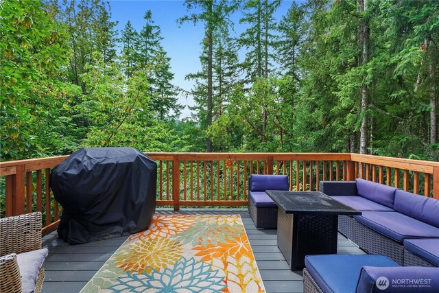 22305 Autumnwood Ct SE, Yelm, WA 98597 - wooden terrace with outdoor lounge area and grilling area