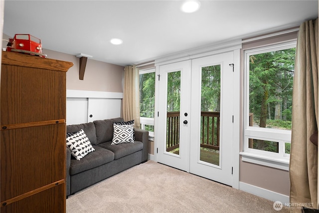 22305 Autumnwood Ct SE, Yelm, WA 98597 - living area featuring carpet flooring, french doors, and recessed lighting