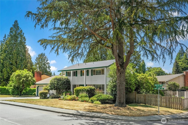 1023 144th Pl SE, Bellevue, WA 98007 - view of front of property with driveway and a garage