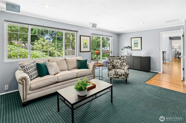 1023 144th Pl SE, Bellevue, WA 98007 - living room featuring carpet floors, ornamental molding, and recessed lighting