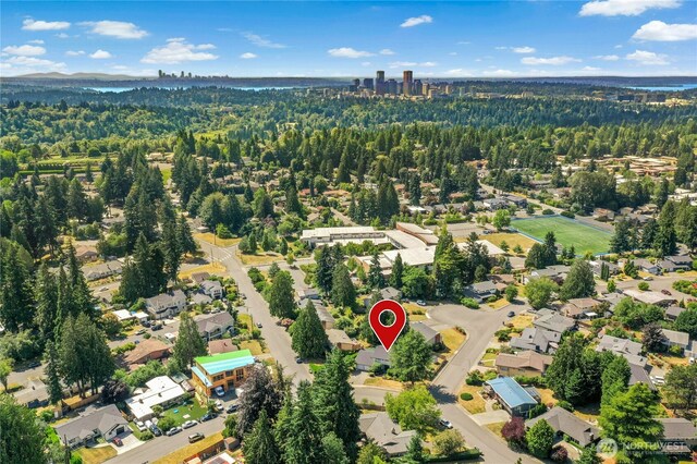 1023 144th Pl SE, Bellevue, WA 98007 - view of property location featuring a heavily wooded area and nearby suburban area