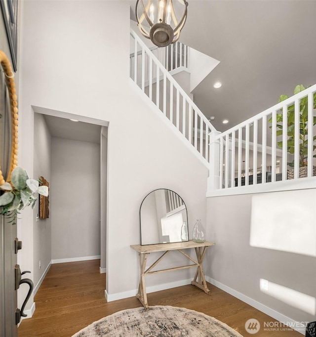 28621 NE 156th St, Duvall, WA 98019 - stairs featuring wood finished floors, recessed lighting, and a chandelier