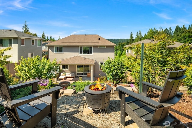 28621 NE 156th St, Duvall, WA 98019 - back of house featuring an outdoor fire pit, a patio area, and roof with shingles