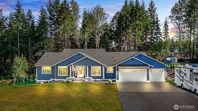 13426 108th St NE, Lake Stevens, WA 98258 - view of front of home featuring concrete driveway, an attached garage, a yard, and a shingled roof