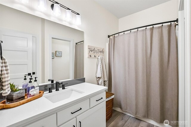 13426 108th St NE, Lake Stevens, WA 98258 - full bathroom featuring vanity and wood finished floors