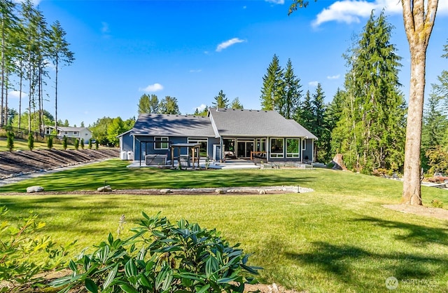 13426 108th St NE, Lake Stevens, WA 98258 - rear view of property featuring a patio area and a lawn