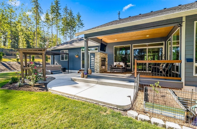 13426 108th St NE, Lake Stevens, WA 98258 - back of house featuring a hot tub and a patio area