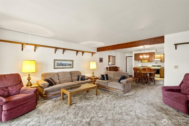 110 Icicle Unit K, Leavenworth, WA 98826 - living room featuring light colored carpet, beamed ceiling, and a textured ceiling